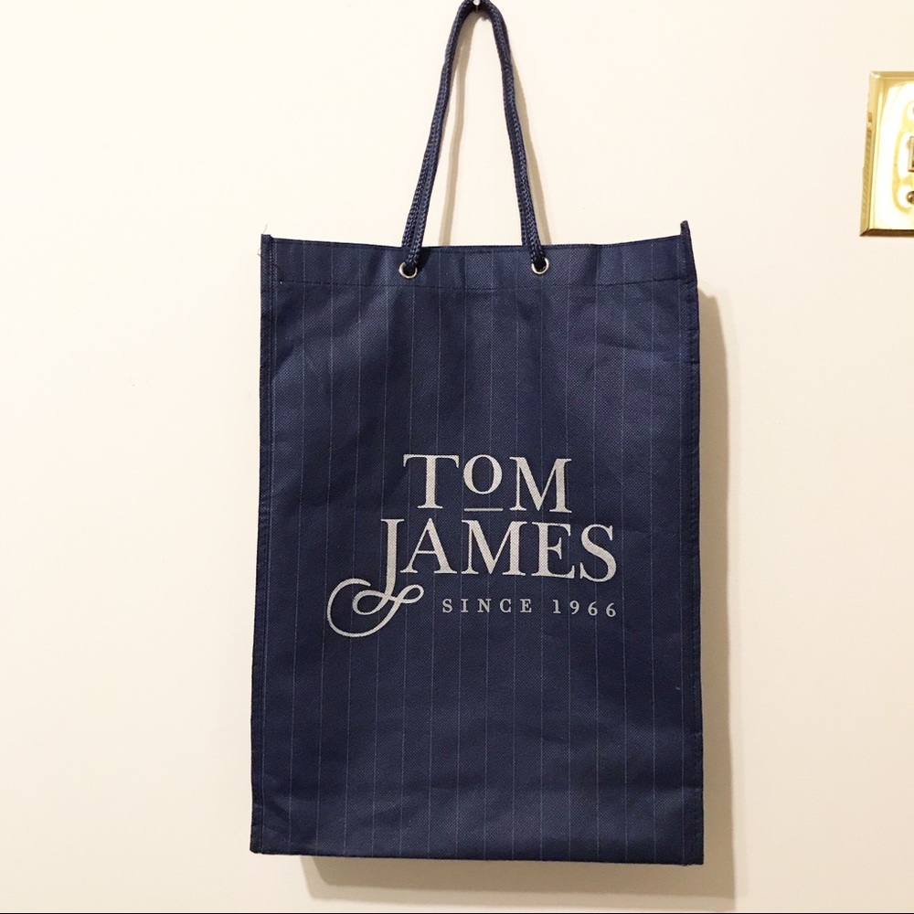 Tom James shopping bag.